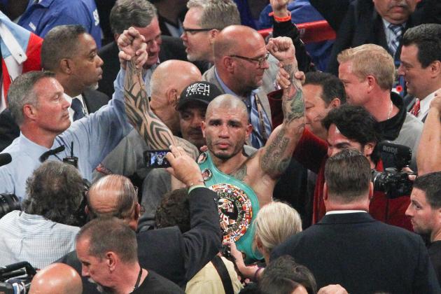 Jun 7, 2014; New York, NY, USA;  Miguel  Cotto reacts after a TKO against Sergio Martinez in the tenth round of WBC World Middleweight fight at Madison Square Garden. Mandatory Credit: Noah K. Murray-USA TODAY Sports