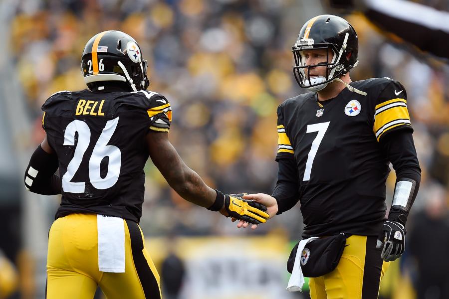 Pittsburgh Steelers outside linebacker James Harrison, right, plays with  defensive back Antwon Blake (41) at practice