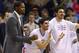 FILE - In this March 8, 2015, file photo, injured Oklahoma City Thunder forward Kevin Durant, left, pumps his fist as teammates Enes Kanter, center, and Steven Adams, right, cheer during the fourth quarter of an NBA basketball game against the Toronto Raptors in Oklahoma City. Durant will have bone graft surgery next week to deal with a fractured bone in his right foot, and he will miss the rest of the season, the Oklahoma City Thunder announced Friday, March 27, 2015. (AP Photo/Sue Ogrocki, File)