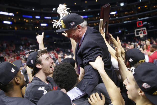 Wisconsin players lift up head coach Bo Ryan as they celebrate their 85-78 win over Arizona in a college basketball regional final to advance to the Final Four in the NCAA Tournament, Saturday, March 28, 2015, in Los Angeles. (AP Photo/Jae C. Hong)