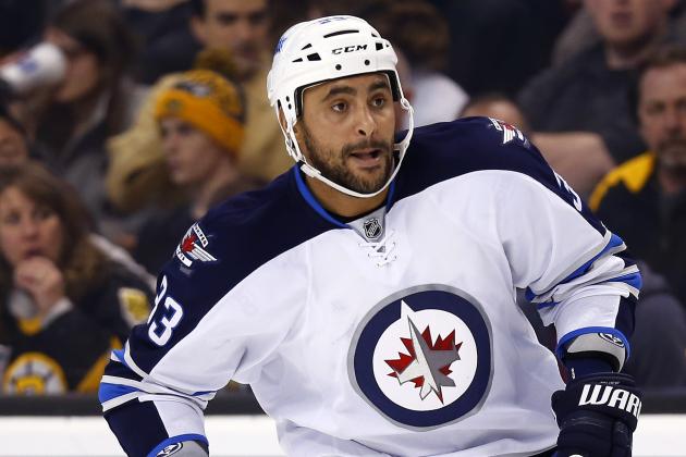 Winnipeg Jets' Dustin Byfuglien during the Boston Bruins 2-1 overtime win over the Winnipeg Jets in an NHL hockey game in Boston Friday, Nov. 28, 2014. (AP Photo/Winslow Townson)