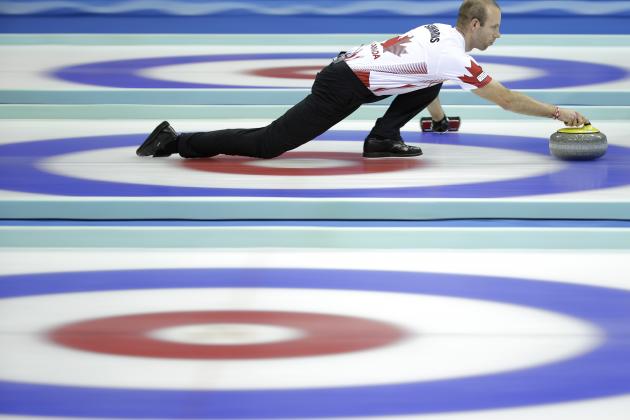 Canada's Pat Simmons delivers the stone during a semi-final match against Sweden at the 2014 World Men's Curling Championship held at the Capital Gymnasium in Beijing, China, Saturday, April 5, 2014. (AP Photo/Alexander F. Yuan)