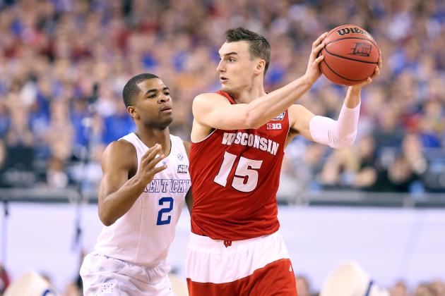 INDIANAPOLIS, IN - APRIL 04: Sam Dekker #15 of the Wisconsin Badgers handles the ball against Aaron Harrison #2 of the Kentucky Wildcats in the first half during the NCAA Men's Final Four Semifinal at Lucas Oil Stadium on April 4, 2015 in Indianapolis, Indiana.  (Photo by Streeter Lecka/Getty Images)