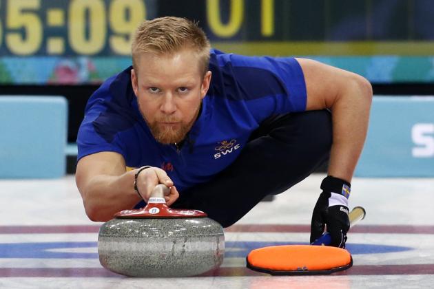 Sweden’s skip Niklas Edin delivers the rock during the men's curling semifinal game against Britain at the 2014 Winter Olympics, Wednesday, Feb. 19, 2014, in Sochi, Russia. (AP Photo/Robert F. Bukaty)