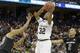 Notre Dame guard Jewell Loyd (32) shoots against South Carolina guard Tina Roy (23) during the second half of the NCAA Women's Final Four tournament college basketball semifinal game, Sunday, April 5, 2015, in Tampa, Fla. (AP Photo/Brynn Anderson)