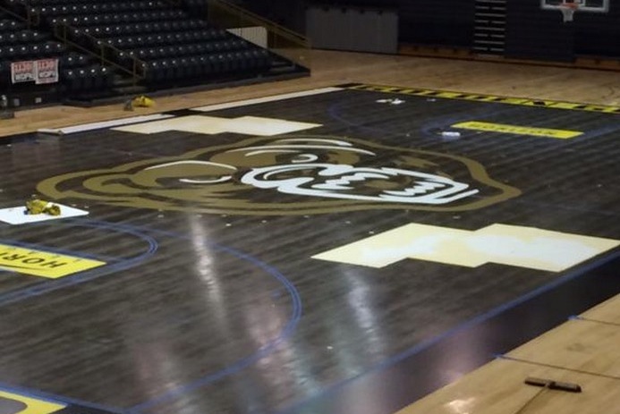 Oakland University Paints Basketball Court Black For Blacktop
