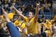 West Virginia student Brian Blend of Buckhannon, W.Va., celebrates with fans on the basketball court following the Mountaineers 70-65 win over No. 2 UCLA Saturday, Feb. 10, 2007 in Morgantown, W.Va. (AP Photo/Jeff Gentner)