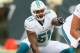 EAST RUTHERFORD, NJ - DECEMBER 01: Mike Pouncey #51 of the Miami Dolphins in action against the New York Jets during their game at MetLife Stadium on December 1, 2013 in East Rutherford, New Jersey. (Photo by Al Bello/Getty Images)