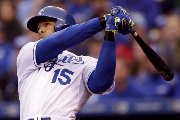 Kansas City Royals right fielder Alex Rios (15) hits a three-run home run during the seventh inning of a baseball game against the Chicago White Sox at Kauffman Stadium in Kansas City, Mo., Monday, April 6, 2015. (AP Photo/Orlin Wagner)