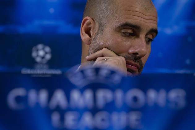 Bayern's head coach Pep Guardiola waits to speak at a press conference in Manchester, England, Monday, Nov. 24, 2014. Bayern Munich will play Manchester City on Tuesday in a Champions League Group E soccer match. (AP Photo/Jon Super)