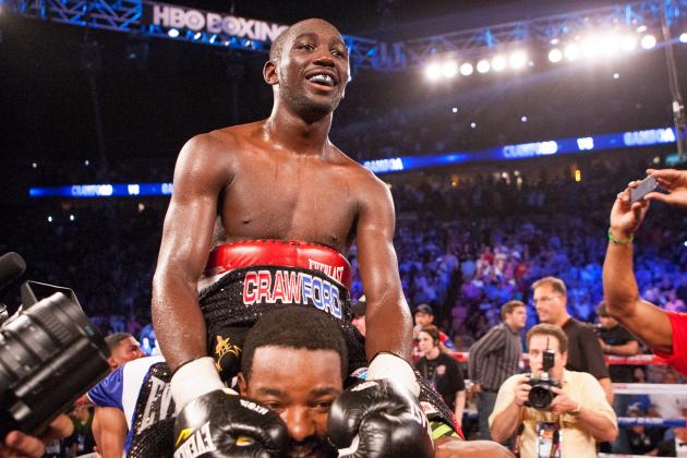 Terence Crawford celebrates his win over Yuriorkis Gamboa in a TKO in the ninth round during the WBO world lightweight championship boxing bout June 28, 2014 in Omaha, Neb., Saturday. (AP Photo/John Peterson)
