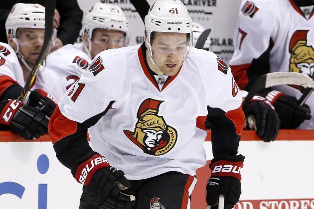 Ottawa Senators' Mark Stone (61) gains control of the puck against the Arizona Coyotes during the first period of an NHL hockey game Saturday, Jan. 10, 2015, in Glendale, Ariz.  (AP Photo/Ross D. Franklin)