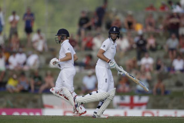 England's Joe Root, right, and Gary Ballance run during day three of the first cricket Test match against West Indies at the Sir Vivian Richards Cricket Ground in Antigua, Antigua and Barbuda, Wednesday, April 15, 2015. (AP Photo/Ricardo Mazalan)