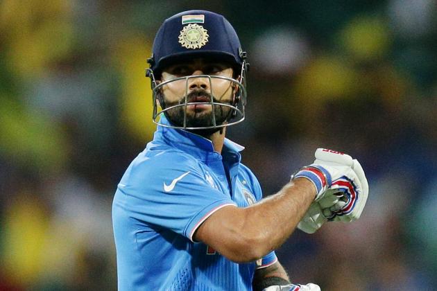 India's Virat Kohli walks from the field after he was dismissed for one run during their Cricket World Cup semifinal against Australia in Sydney, Australia, Thursday, March 26, 2015. (AP Photo/Rob Griffith)