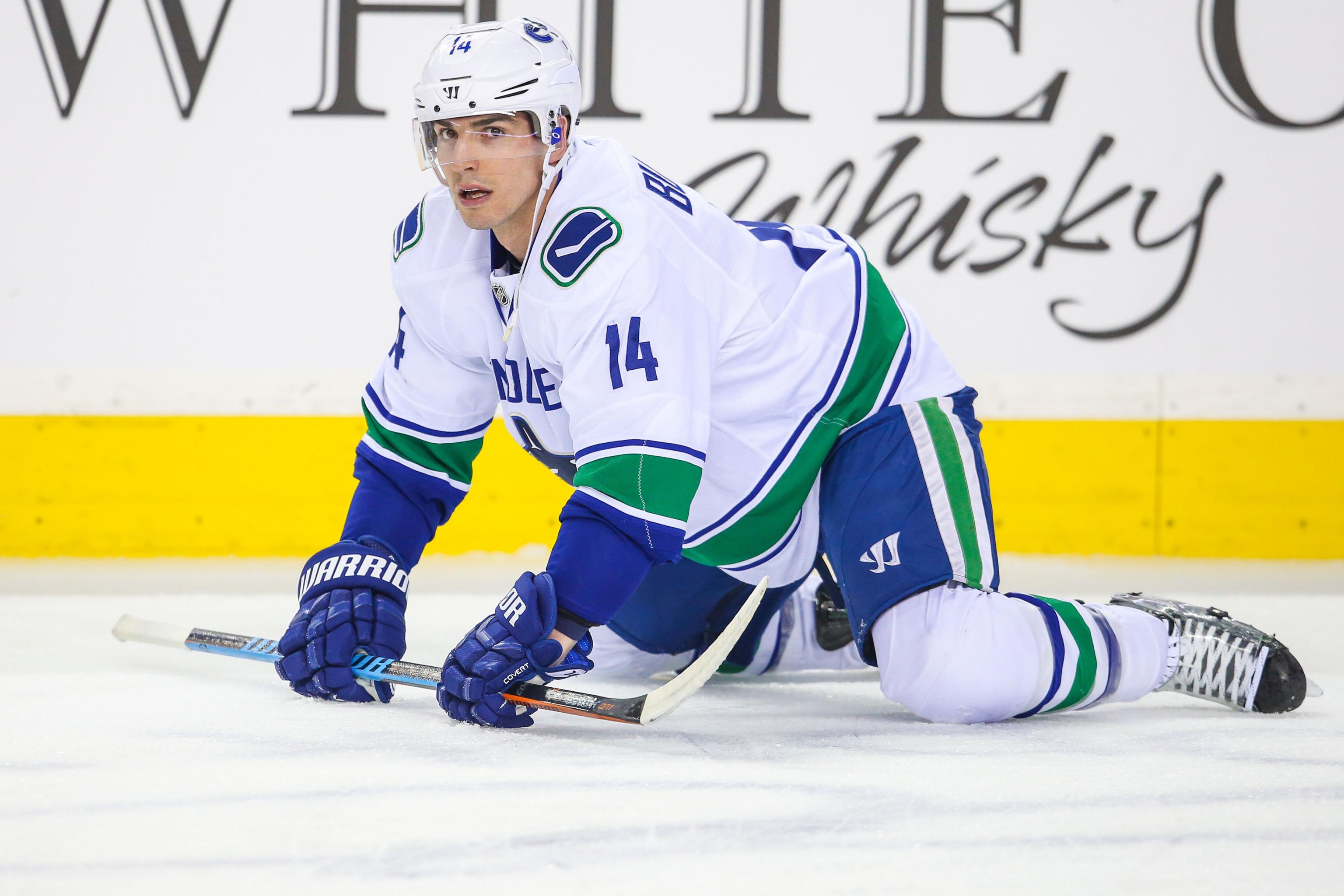 Alex Burrows leaves Canucks practice on stretcher 