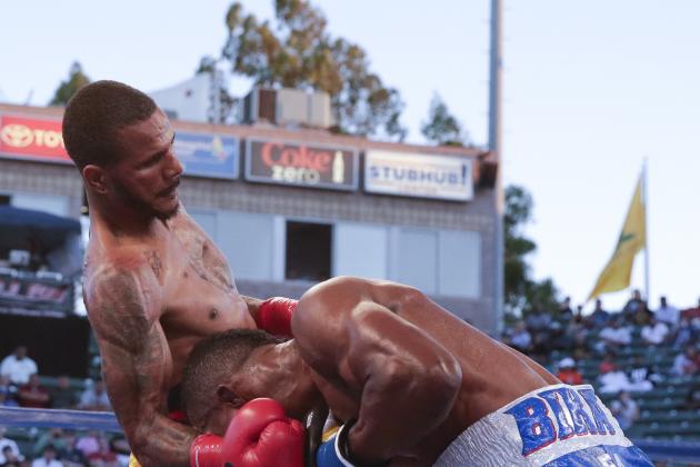 Sakio Bika, right, gets hit by Anthony Dirrell during their WBC super middleweight title boxing bout Saturday, Aug. 16, 2014, in Carson, Calif. (AP Photo/Chris Carlson)