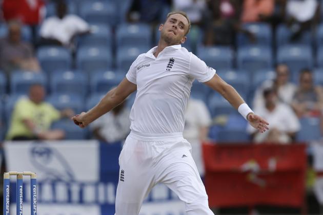 England's Stuart Broad, right, bowls under the watch of West Indies' Devendra Bishoo on day two of their second Test match at the National Stadium in St. George's, Grenada, Wednesday, April 22, 2015. (AP Photo/Ricardo Mazalan)