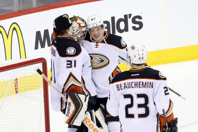Apr 22, 2015; Winnipeg, Manitoba, CAN; Anaheim Ducks center Rickard Rakell (67) celebrates with goalie Frederik Andersen (31) after the third period in game four of the first round of the 2015 Stanley Cup Playoffs against the Winnipeg Jets at MTS Centre. Anaheim wins the game 5-2 and sweeps the series 4-0. Mandatory Credit: Bruce Fedyck-USA TODAY Sports