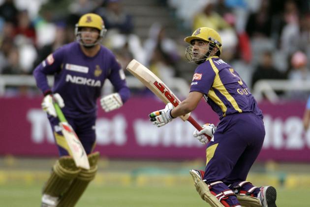 Kolkata Knight Riders Gautam Gambhir, right, makes a run against the Titans during a Champions League Twenty20  game in Cape Town, South Africa, Sunday, Oct 21, 2012. (AP Photo/Schalk van Zuydam)
