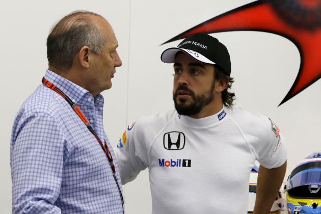 McLaren driver Fernando Alonso of Spain, right, speaks with McLaren president Ron Dennis in the pit during the second free practice ahead of the Bahrain Formula One Grand Prix at the Formula One Bahrain International Circuit in Sakhir, Bahrain, Friday, April 17, 2015. The Bahrain Formula One Grand Prix will take place here on Sunday. (AP Photo/Luca Bruno)
