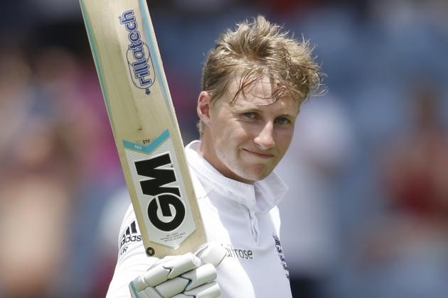 England's Joe Root waves his bat as he leaves the field with 182 runs at the end of the first inning during day four of the second Test against West Indies match at the National Stadium in St. George's, Grenada, Friday, April 24, 2015. (AP Photo/Ricardo Mazalan)