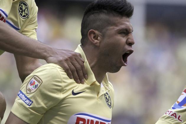 America's Oribe Peralta celebrates after scoring against Cruz Azul during a Mexican soccer league match in Mexico City, Saturday, April 4, 2015. (AP Photo/Christian Palma)