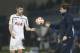 Tottenham's coach Mauricio Pochettino, right gives the ball to Tottenham Hotspur's Ben Davies during the Europa League group C soccer match between Asteras Tripolis and Tottenham at the Theodoros Kolokotronis stadium stadium in Tripolis, Greece, Thursday, Nov. 6, 2014. (AP Photo/Petros Giannakouris)