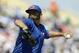 Toronto Blue Jays starting pitcher Ricky Romero throws during the first inning of a spring exhibition baseball game against the Detroit Tigers in Lakeland, Fla., Tuesday, March 18, 2014. (AP Photo/Carlos Osorio)