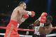 Wladimir Klitschko, left, of Ukraine, fights Bryant Jennings during the second round a boxing match Saturday, April 25, 2015, at Madison Square Garden in New York. (AP Photo/Frank Franklin II)