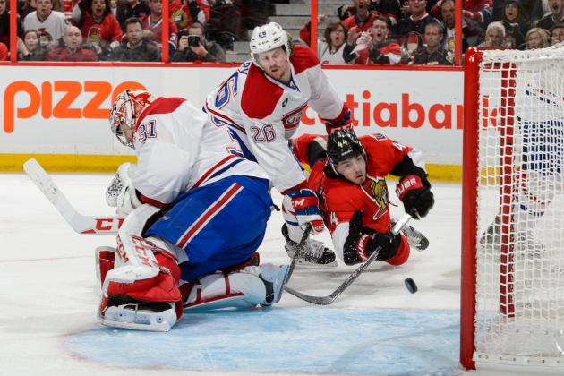 OTTAWA, ON - APRIL 26: Goaltender Carey Price #31 looses sight of the puck as teammate Jeff Petry #26 of the Montreal Canadiens tries to defend against Jean-Gabriel Pageau #44 of the Ottawa Senators as he dives in Game Six of the Eastern Conference Quarterfinals during the 2015 NHL Stanley Cup Playoffs at Canadian Tire Centre on April 26, 2015 in Ottawa, Ontario, Canada. (Photo by Minas Panagiotakis/Getty Images)