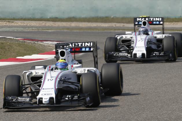 Williams drivers Felipe Massa of Brazil is followed by teammate Valtteri Bottas of Finland during the Chinese Formula One Grand Prix at Shanghai International Circuit in Shanghai, China, Sunday, April 12, 2015. Mssa finished fifth as Bottas was sixth. (AP Photo/Toru Takahashi)