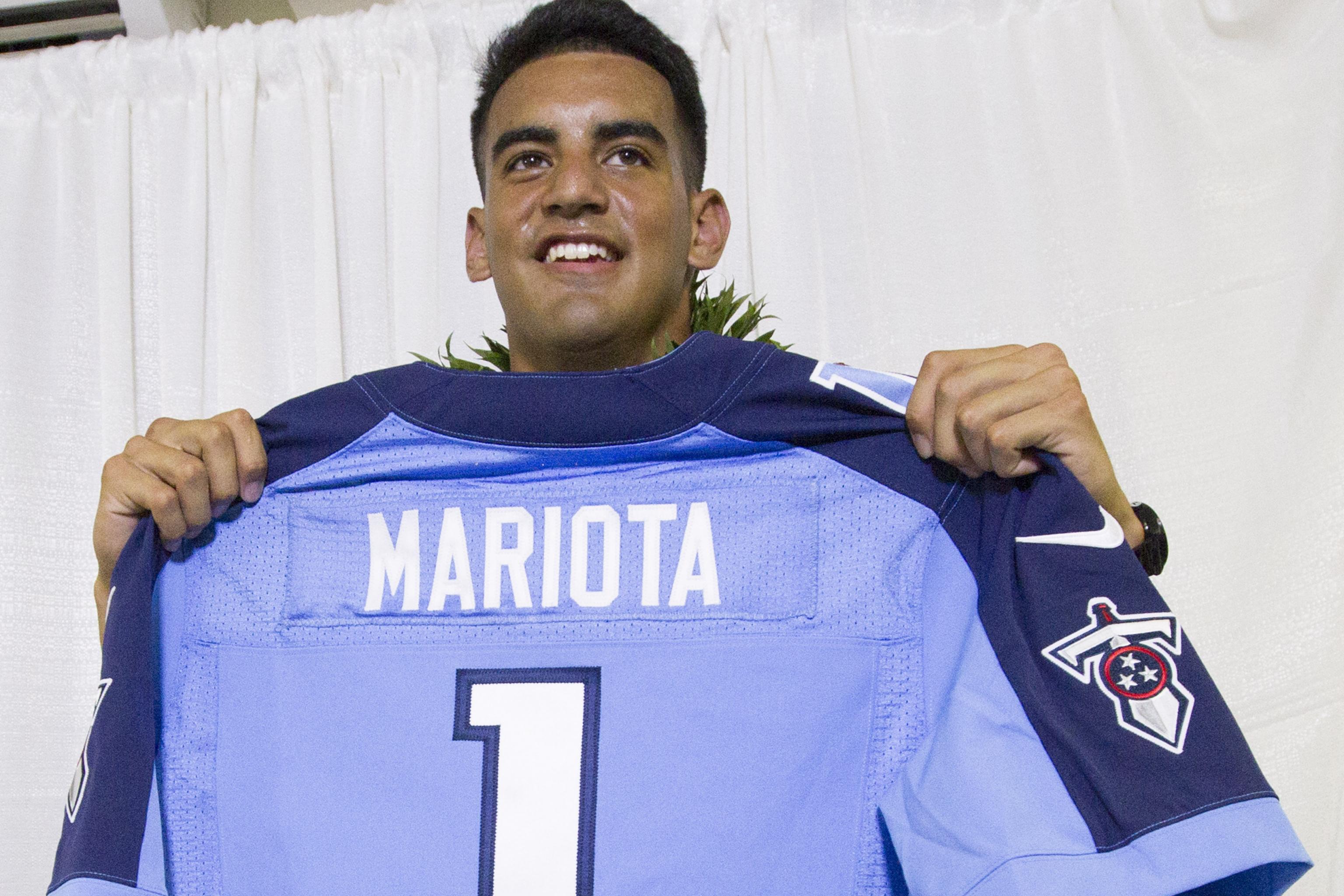 Who is Tennessee Titans quarterback Marcus Mariota, when was he drafted and  how many playoff games has he played?