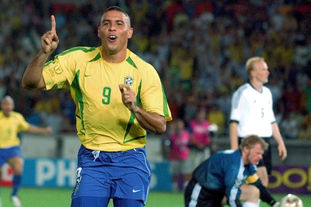 FILE - In this June 30, 2002, file photo, Brazil's Ronaldo reacts after scoring past Germany's goalkeeper Oliver Kahn, center, and Carsten Ramelow during their 2002 World Cup final soccer match, at the Yokohama stadium in Yokohama, Japan. On this day: Brazil wins its fifth World Cup as Ronaldo strikes twice to defeat Germany 2-0. (AP Photo/Dusan Vranic, File)
