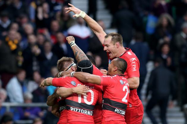 LONDON, ENGLAND - MAY 02:  Drew Mitchell (L-headband) of Toulon is congratulated by teammates after scoring his team's second try during the European Rugby Champions Cup Final match between ASM Clermont Auvergne and RC Toulon at Twickenham Stadium on May 2, 2015 in London, England.  (Photo by David Rogers/Getty Images)