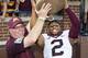 Minnesota head coach Jerry Kill, left, and defensive back Cedric Thompson (2) lift up the Little Brown Jug trophy after an NCAA college football game against Michigan in Ann Arbor, Mich., Saturday, Sept. 27, 2014. Minnesota won 30-14. (AP Photo/Tony Ding)