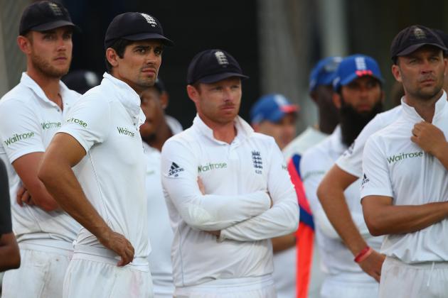 BRIDGETOWN, BARBADOS - MAY 03:  Alastair Cook (2L) the captain of England  looks on at the after match presentations alongside Stuart Broad (L), Ian Bell (C) and Jonathan Trott as the series was squared 1-1 after West Indies won the match by five wickets during day three of the 3rd Test match between West Indies and England at Kensington Oval on May 3, 2015 in Bridgetown, Barbados.  (Photo by Michael Steele/Getty Images)