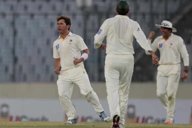 Pakistan’s Yasir Shah, left, and his teammates celebrate the dismissal of Bangladesh’s captain Mushfiqur Rahim during their second day of the second test cricket match in Dhaka, Bangladesh, Thursday, May 7, 2015. (AP Photo/ A.M. Ahad)