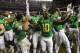 SANTA CLARA, CA - DECEMBER 05: Johnathan Loyd #10 of the Oregon Ducks celebrates their PAC-12 Championship victory against the Arizona Wildcats at Levi's Stadium on December 5, 2014 in Santa Clara, California. (Photo by Thearon W. Henderson/Getty Images)