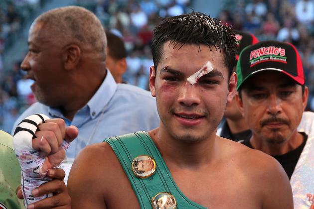 LOS ANGELES, CA - AUGUST 16: Omar Figueroa Jr. poses with his belt after defeating Daniel Estrada in their WBC Lightweight World Championship fight at StubHub Center on August 16, 2014 in Los Angeles, California. (Photo by Stephen Dunn/Getty Images)