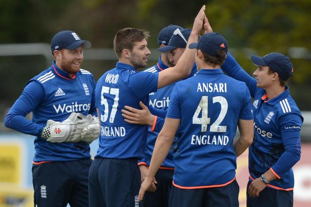 MALAHIDE, IRELAND - MAY 08:  Mark Wood of England celebrates with teammates after bowling Ireland captain William Porterfieldduring the Royal London One Day International between Ireland and England at Malahide Cricket Club on May 8, 2015 in Malahide, Ireland.  (Photo by Gareth Copley/Getty Images)
