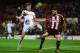 BRENTFORD, ENGLAND - MAY 08: Patrick Bamford of Middlesbrough and Harlee Dean of Brentford battle for the ball during the Sky Bet Championship Playoff semi-final first leg match between Brentford and Middlesbrough at Griffin Park on May 8, 2015 in Brentford, England. (Photo by Jamie McDonald/Getty Images)
