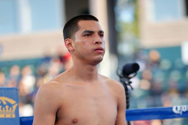 LOS ANGELES, CA - APRIL 26:  Omar Figueroa Jr. taunts Jerry Belmontes from the corner during their WBC Lightweight World Championship title bout at StubHub Center on April 26, 2014 in Los Angeles, California.  (Photo by Joe Scarnici/Getty Images)