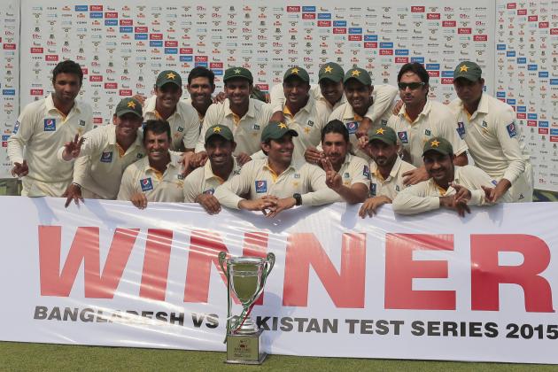 Pakistan’s cricket players pose for a group photograph with the winner's trophy for their series against Bangladesh in Dhaka, Bangladesh Saturday, May 9, 2015. (AP Photo/ A.M. Ahad)