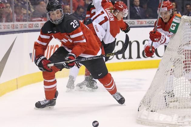 TORONTO, ON - JANUARY 2:  Lawson Crouse #28 of Team Canada chases down a puck against Team Denmark during a quarter-final game in the 2015 World Junior Hockey Championship at the Air Canada Centre on January 2, 2015 in Toronto, Ontario, Canada. Team Canada defeated Team Denmark 8-0. (Photo by Claus Andersen/Getty Images)