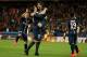 Paris Saint Germain's Maxwell, center, celebrates with teammates Paris Saint Germain's Zlatan Ibrahimovic and Marco Verratti after scoring a goal, during his League One soccer match against Guingamp, at the Parc des Princes stadium, in Paris, France, Friday, May 8, 2015. (AP Photo/Thibault Camus)