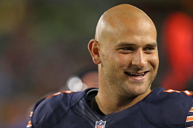 CHICAGO, IL - AUGUST 15:  Kyle Long #75 of the Chicago Bears smiles at a teammate on the sidelines during a game against the San Diego Chargers at Soldier Field on August 15, 2013 in Chicago, Illinois. The Bears defeated the Chargers 33-28.  (Photo by Jonathan Daniel/Getty Images)