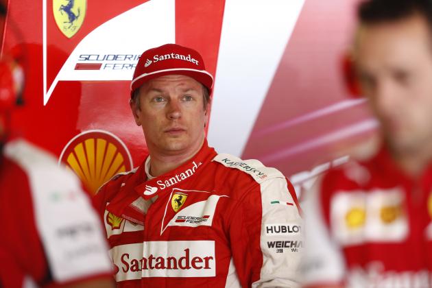 Ferrari driver Kimi Raikkonen of Finland stands inside his box at the end of the second session for the Spain Formula One Grand Prix at the Barcelona Catalunya racetrack in Montmelo, just outside Barcelona, Spain, Friday, May 8, 2015. (AP Photo/Manu Fernandez)