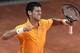 Serbia's Novak Djokovic celebrates after defeating Switzerland's Roger Federer in their men's final match at the Italian Open tennis tournament, in Rome, Sunday, May 17, 2015. Djokovic won 6-4 6-3. (Claudio Onorati/ANSA via AP) ITALY OUT