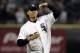 Sen. Barack Obama, D-Ill. throws out the cermonial first pitch before Game 2 of the American League Championship Series between the Chicago White Sox and the Los Angeles Angels at U.S. Cellular Field in Chicago, Wednesday, Oct. 12, 2005. (AP Photo/Ann Heisenfelt)