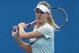 MELBOURNE, AUSTRALIA - JANUARY 26: Eugenie Bouchard of Canada plays a backhand in a practice session during day eight of the 2015 Australian Open at Melbourne Park on January 26, 2015 in Melbourne, Australia. (Photo by Hannah Peters/Getty Images)